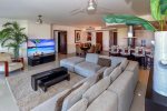 Ocean view living room with flat screen HDTV with satellite and DVD player